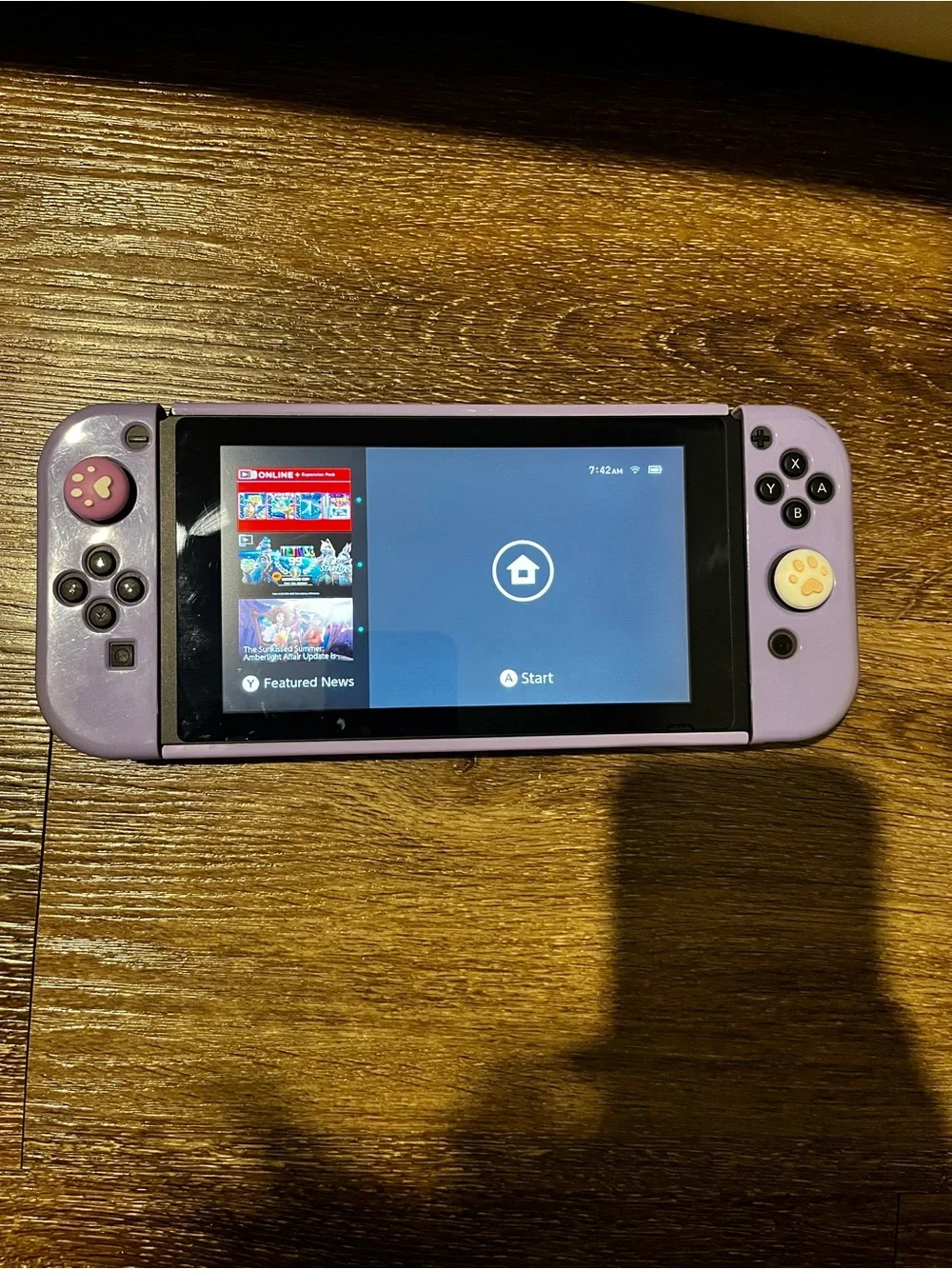 Nintendo switch Lavender Handheld Console with Paw Grip Caps